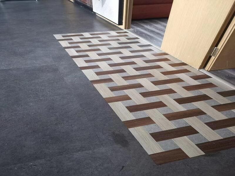 laboratory technician testing commercial flooring indentation and wear resistance